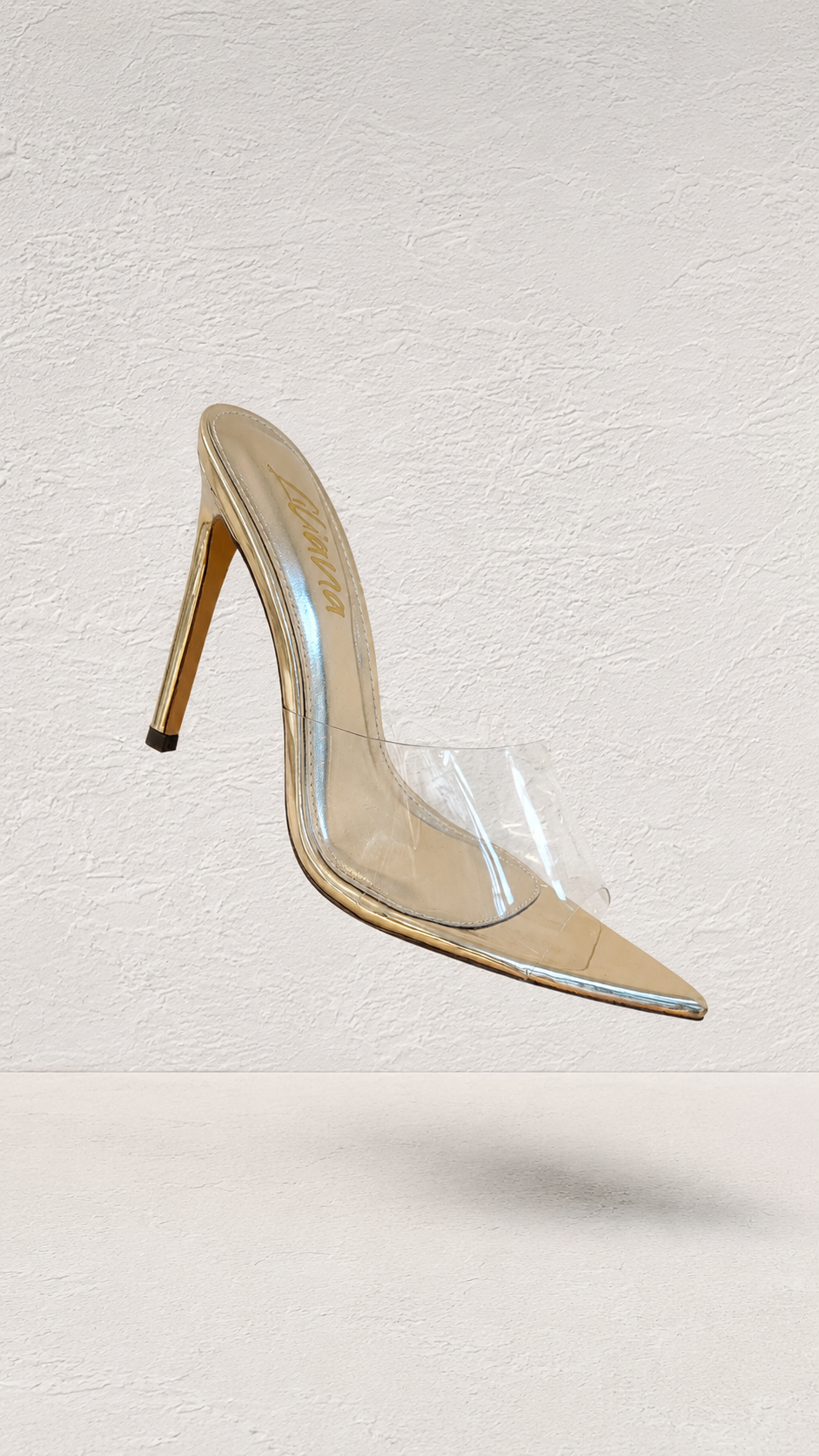 HEELS TRANSPARENTE PUNTA PICO DORADO