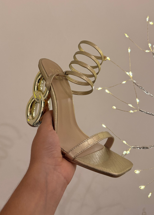 HEELS DORADOS TACÓN CADENA ESPIRAL SUELA CROCO